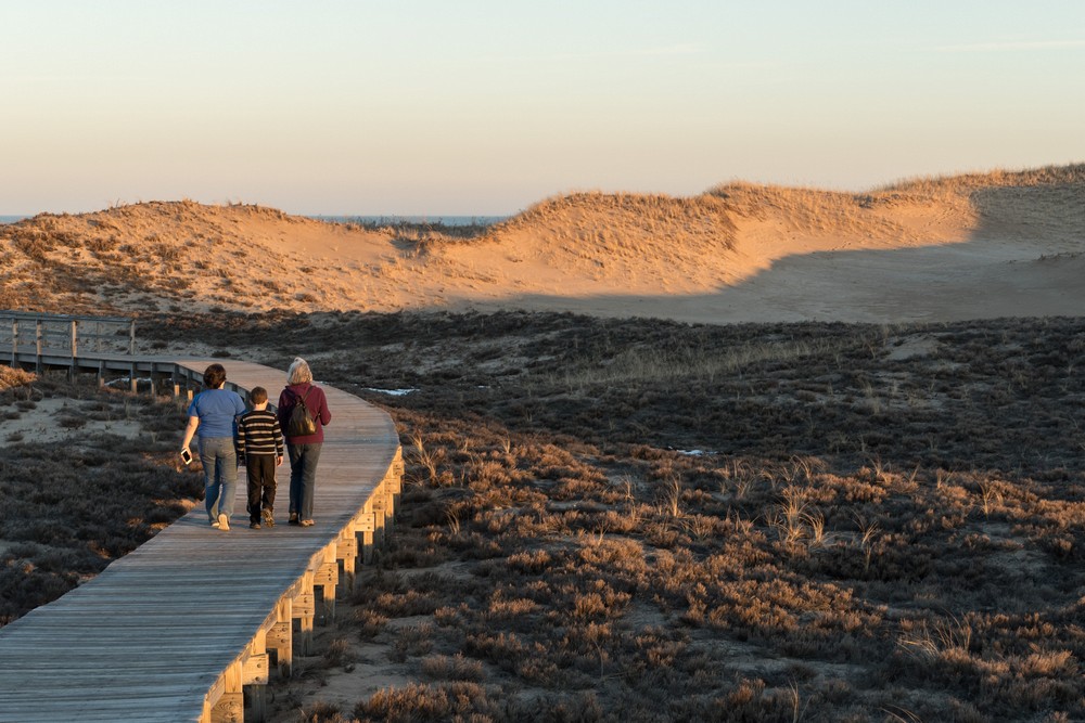 Miranda, Matthew, and Joyce on boardwalk from parking lot #3.<br />Feb. 23, 2017 -  Parker River National Wildlife Refuge, Plum Island, Massachusetts.