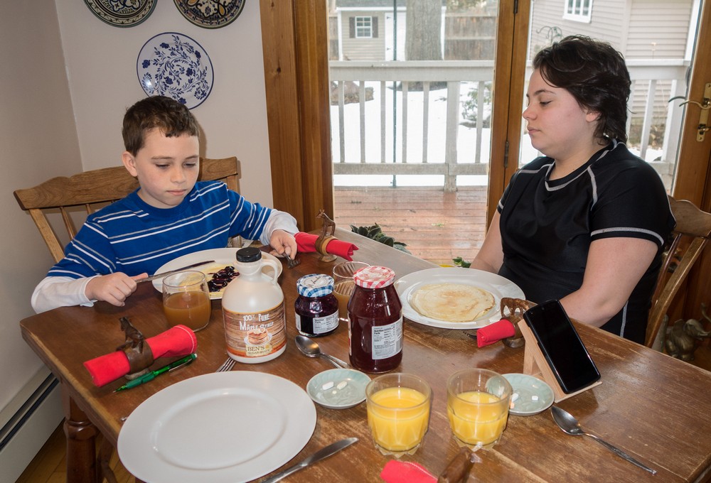 Matthew and Miranda at the traditional crepes breakfast.<br />Feb. 24, 2017 - At home in Merrimac, Massachusetts.