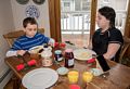 Matthew and Miranda at the traditional crepes breakfast.<br />Feb. 24, 2017 - At home in Merrimac, Massachusetts.
