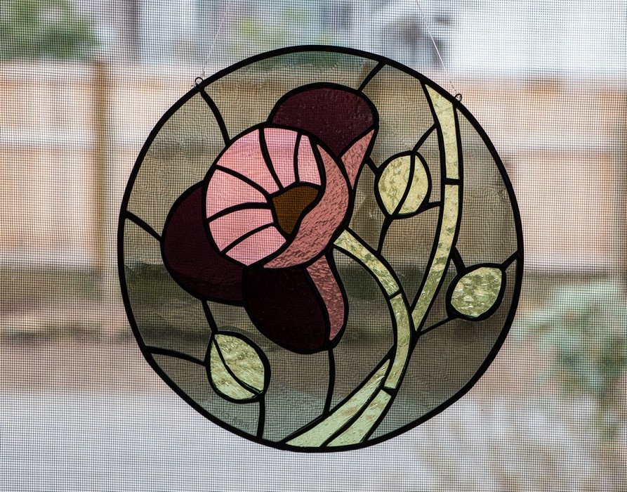 Stained glass piece hanging in the kitchen window.<br />Just got a new Panasonic 35-70 mm, f2.8 lens.<br />March 10, 2017 - At home in Merrimac, Massachusetts.
