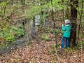 Joyce photographing some spring flowers.<br />On our usual 2 mile walk.<br />May 6, 2017 - Merrimac, Massachusetts.