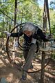 Joyce on leg that combined a cable walk and hoops.<br />May 21, 2017 - Tree Top Adventures in Canton, Massachusetts.