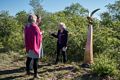 Visitors, Joyce and her sculpture Optimism.<br />Power of Place sculpture exhibit.<br />June 7, 2017 - Wells Reserve at Laudholm, Wells, Maine.