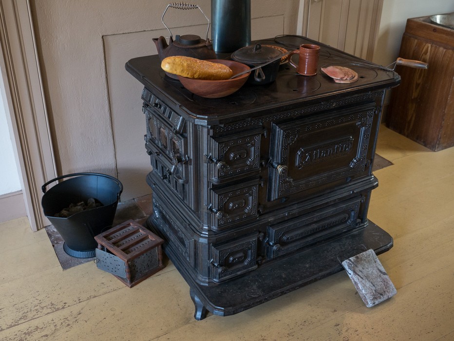 Wood burning stove.<br />Goodwin Mansion.<br />June 26, 2016 - Strawbery Banke, Portsmouth, New Hampshire.