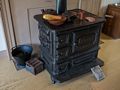 Wood burning stove.<br />Goodwin Mansion.<br />June 26, 2016 - Strawbery Banke, Portsmouth, New Hampshire.