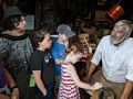 Miranda, Matthew, and others listening to master cooper Ron Raiselis.<br />June 26, 2016 - Strawbery Banke, Portsmouth, New Hampshire.