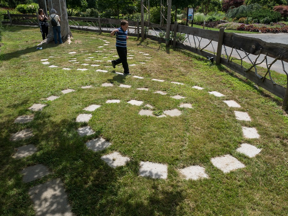 Miranda and Joyce at the chimes and Matthew on the spiral trail.<br />July 28, 2017 - The Gardens at Elm Bank, Wellesley, Massachusetts.