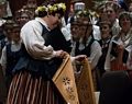 Singing Latvian songs.<br />Latvian Song and Dance Festival.<br />July 3, 2017 - Joseph Meyerhoff Symphony Hall, Baltimore, Maryland.