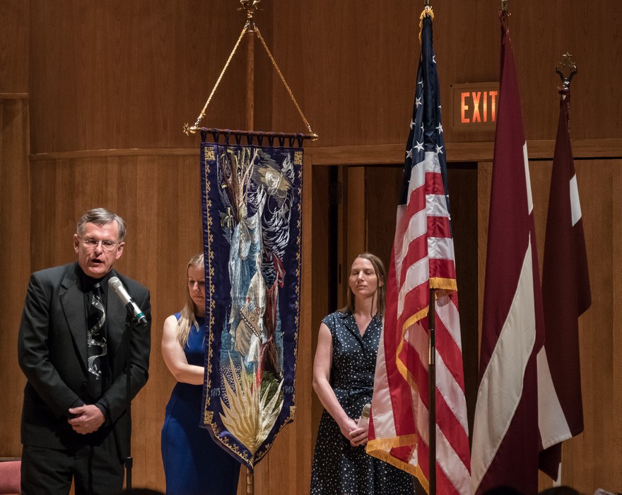 Passing of the festival banner to Toronto organizers for the 2019 festival.<br />Latvian Song and Dance Festival.<br />July 3, 2017 - Joseph Meyerhoff Symphony Hall, Baltimore, Maryland.
