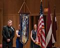 Passing of the festival banner to Toronto organizers for the 2019 festival.<br />Latvian Song and Dance Festival.<br />July 3, 2017 - Joseph Meyerhoff Symphony Hall, Baltimore, Maryland.