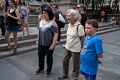 Miranda, Joyce, and Matthew being entertained by the street dancers.<br />July 12, 2017 - Manhattan, New York City, New  York.