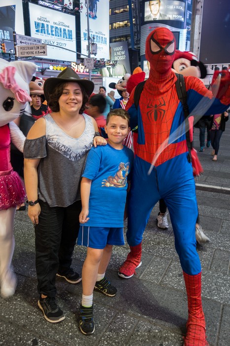 Miranda, Matthew, and Spiderman in Times Square.<br />July 12, 2017 - Manhattan, New York City, New  York.