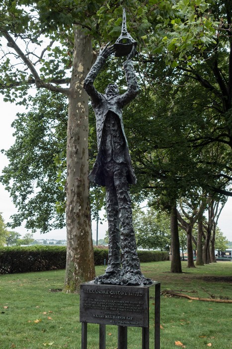 Sculpture of Alexandre Gustave Eiffel, who designed the framework for the Statue of Libery.<br />July 13, 2017 - Manhattan, New York City, New  York.