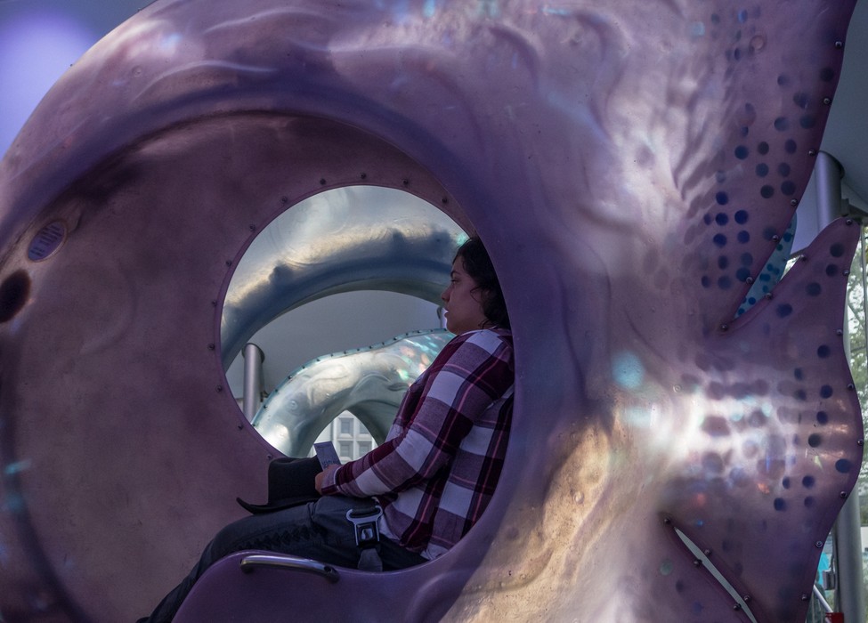 Miranda on the SeaGlass Carousel at Battery Park.<br />July 13, 2017 - Manhattan, New York City, New  York.