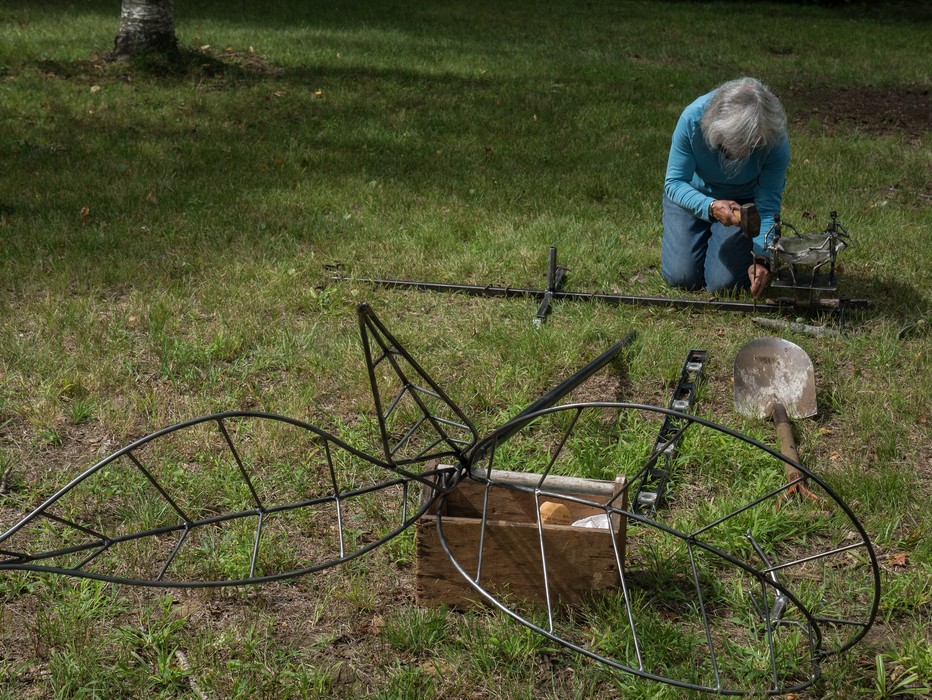 Joyce Audy Zarins installing her 'Safety Net'.<br />Maudslay Outdoor Sculpture show installation.<br />Sep. 9, 2017 - Maudslay State Park, Newburyport, Massachusetts.