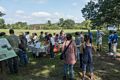 Joyce among the artists and guests at the goodies table area.<br />Outdoor Art Show opening and walk through.<br />Sept. 16, 2017 - Maudslay State Park, Newburyport, Massachusetts.