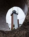 Lighthouse through one of the sculptures at the Newburyport Art Association.<br />Sept. 21, 2017 - Newburyport, Massachusetts.
