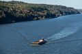 Tugboat pushing barge on the Hudson River.<br />Oct. 20, 2017 - On the Poughkeepsie-Highland bridge, New York.