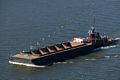 Tugboat pushing barge on the Hudson River.<br />Oct. 20, 2017 - On the Poughkeepsie-Highland bridge, New York.