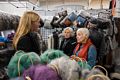 Baiba talking to the Swedish wool lady while Joyce and Ronnie stand by.<br />Sheep & Wool Festival.<br />Oct. 21, 2017 - Rhinebeck, New York.