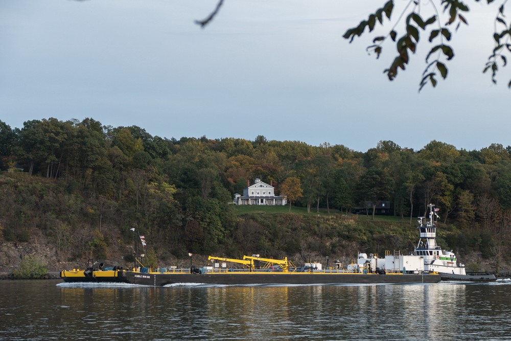 A barge on the Hudson River heading North.<br />Oct. 21, 2017 - Saugerties Lighthouse, Saugerties, New York.