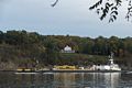 A barge on the Hudson River heading North.<br />Oct. 21, 2017 - Saugerties Lighthouse, Saugerties, New York.