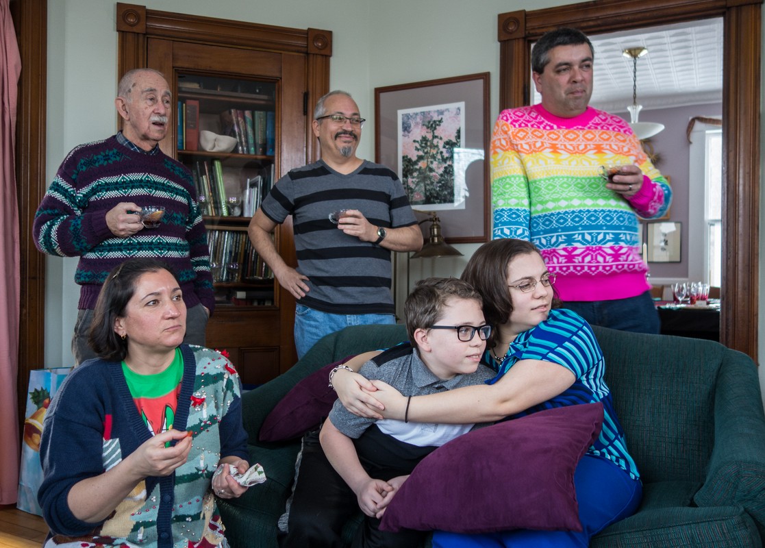 Ronnie, Melody, Carl, Matthew, Miranda, and Sati watching photos on the TV screen.<br />Dec. 25, 2017 - At home in Merrimac, Massachusetts.