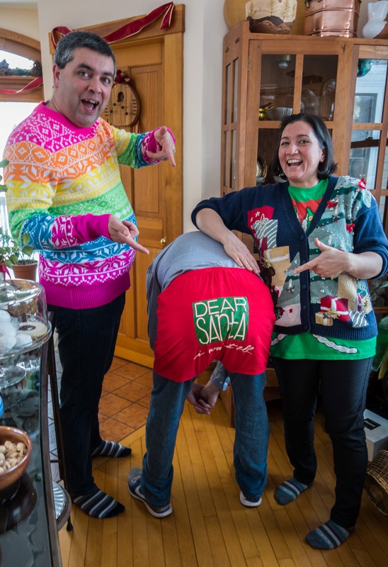 Sati, Paul, and Melody in their Christmas outfits. Paul's shorts say 'Dear Santa, I want it all'.<br />Dec. 25, 2017 - At home in Merrimac, Massachusetts.