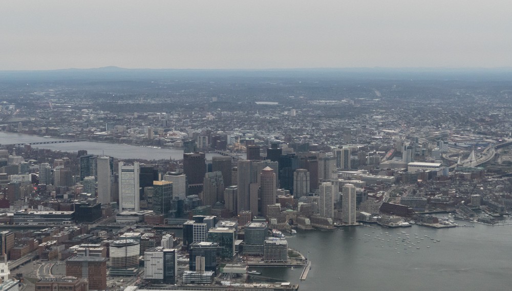 Boston from departing jetliner.<br />April 15, 2017 - Leaving Logan Airport, Boston, Massachusetts.