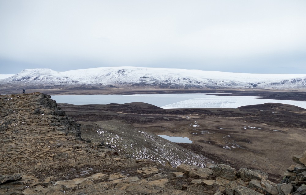 View from the top with Marks at the far end.<br />April 17, 2017 - At Borgarvirki off Rte. 1, Iceland.