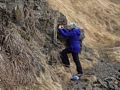 Joyce photographing flowers.<br />A second hike along the Syri-Hvamms.<br />April 20, 2017 - Hvammstangi, Iceland.