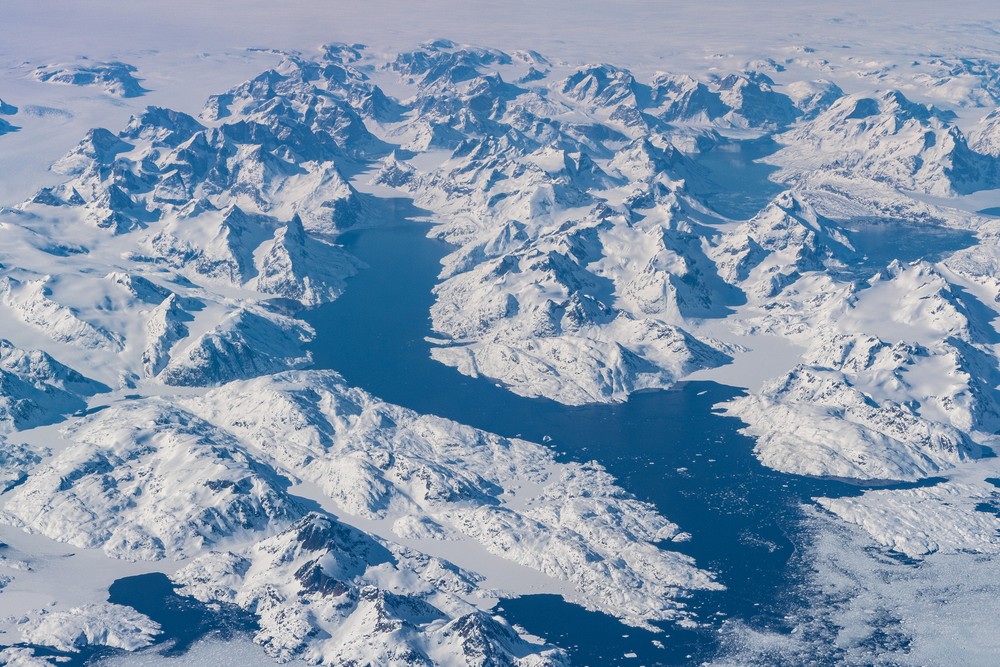 61.710645, -42.489606 (?)<br />April 22, 2017 - Flying over Greenland.