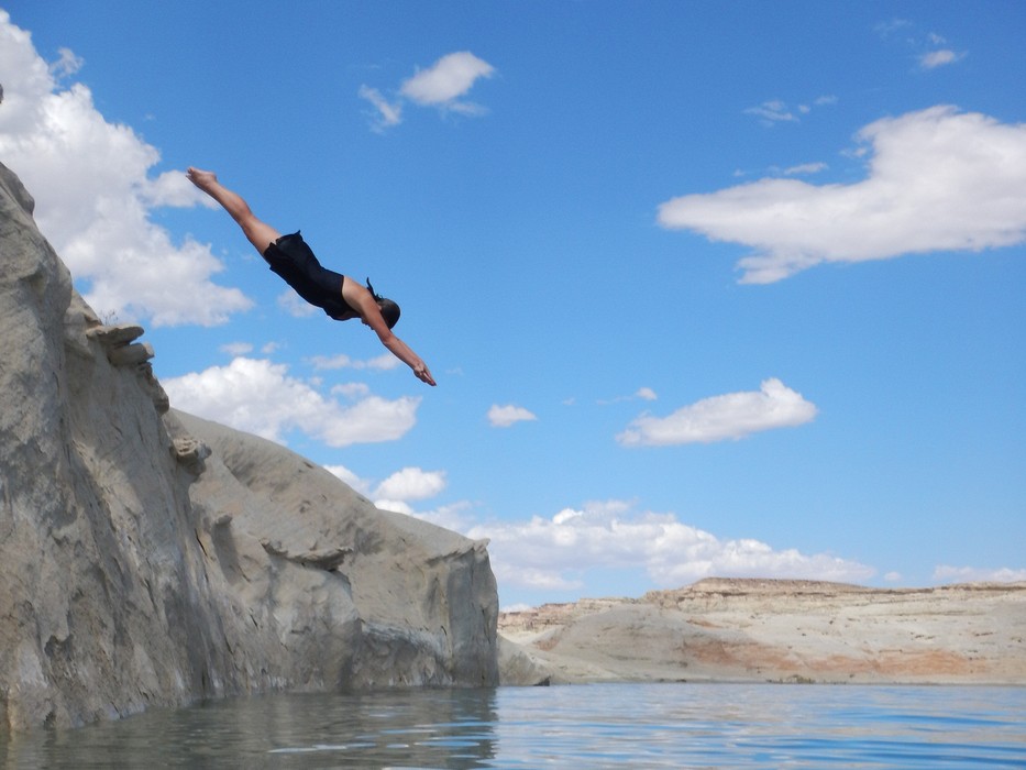 Holly showing her diving skill (however, she lost her contacts on contact).<br />Kayaking with Lake Powell Hidden Canyon Kayak off Lone Rock Beach.<br />Aug. 10, 2017 - Lake Powell, Utah.