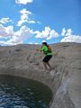 Matthew jumping.<br />Kayaking with Lake Powell Hidden Canyon Kayak off Lone Rock Beach.<br />Aug. 10, 2017 - Lake Powell, Utah.