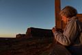 Joyce checking a photo on her cellphone.<br />Aug. 14, 2017 - Monument Valley Navajo Tribal Park, Arizona.
