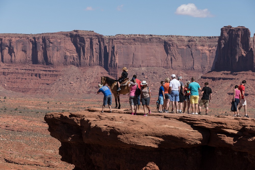 Carl photographing Matthew on the horse.<br />On tour with Navajo Spirit Tours.<br />Aug. 14, 2017 - Monument Valley Navajo Tribal Park, Arizona.