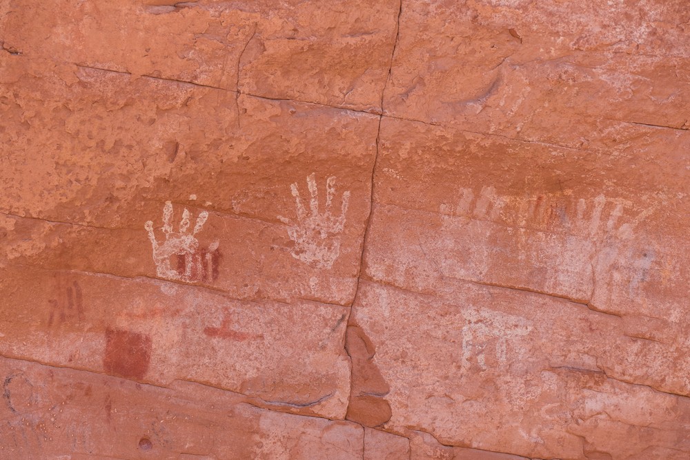 Handprints on the wall.<br />On tour with Navajo Spirit Tours.<br />Aug. 14, 2017 - Monument Valley Navajo Tribal Park, Arizona.