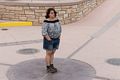 Miranda at the Four Corners Monument.<br />Aug. 15, 2017 - Four Corners, Arizona, Colorado, New Mexico, Utah.