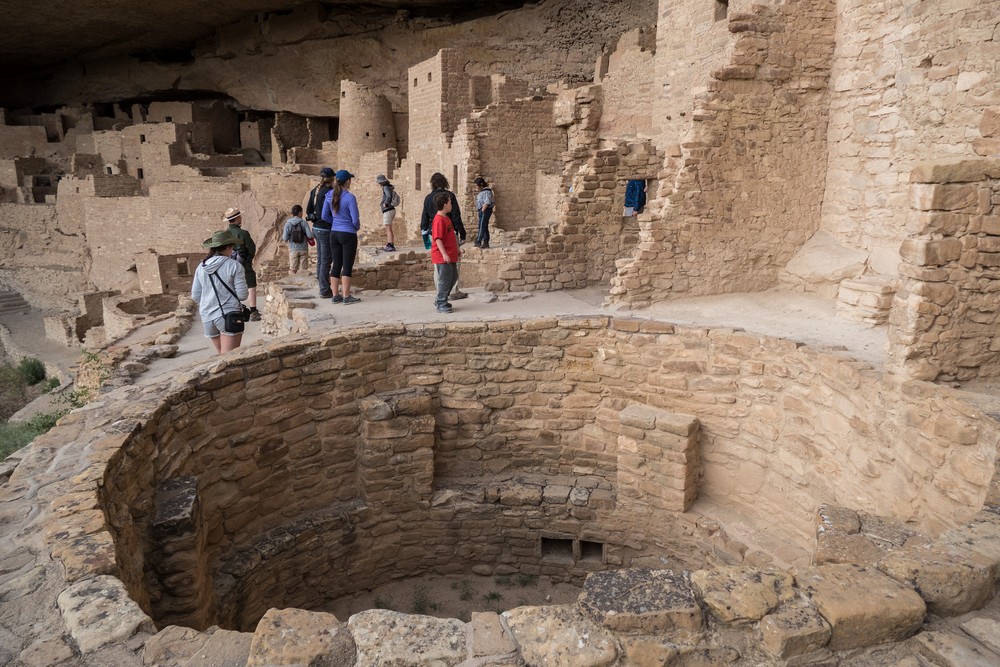 Matthew, Holly, and Miranda and a kiva.<br />The evening tour of Cliff Palace.<br />Aug. 15, 2017 - Mesa Verde National Park, Colorado.