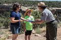 The ranger hands Miranda and Matthew their Junior Ranger badges and certificates.<br />Aug. 16, 2017 - Mesa Verde National Park, Colorado.