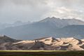 View of dunes of the Great Sand Dunes National Park with Sangre de Cristo mountains in back.<br />Aug. 17, 2017 - Great Sand Dunes Lodge, Mosca, Colorado.