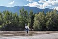 Joyce crossing Medano Creek at the base of the dunes.<br />Aug. 18, 2017 - Great Sand Dunes National Park, Colorado.