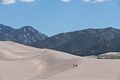 People enjoying the dunes and the view.<br />Aug. 18, 2017 - Great Sand Dunes National Park, Colorado.