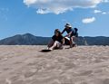 Miranda getting some help from Holly.<br />Aug. 18, 2017 - Great Sand Dunes National Park, Colorado.
