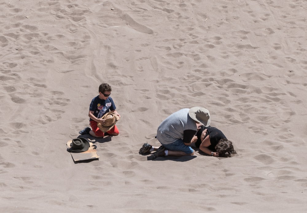 Miranda got hurt (temporarily) and Carl in checking on her while Matthew stands by.<br />Aug. 18, 2017 - Great Sand Dunes National Park, Colorado.