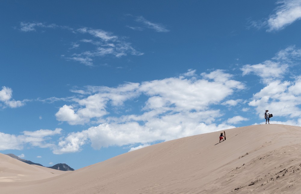 Matthew struggling up the dune while Carl waits for him.<br />Aug. 18, 2017 - Great Sand Dunes National Park, Colorado.