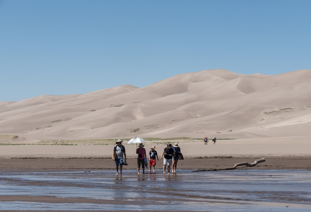 Carl, Joyce, Matthew, Miranda, and Holly.<br />Crossing the Medano Creek.<br />Aug. 18, 2017 - Great Sand Dunes National Park, Colorado.