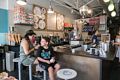 Miranda and Matthew enjoying their second serving of ice cream.<br />Aug. 19, 2017 - Sweet Cow, Denver, Colorado.