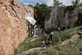 Matthew, Holly, Joyce, Carl climbing out of an old clay mining pit full of dinosaur tracks.<br />Aug. 19, 2017 - Triceratops Trail, Golden, Colorado.