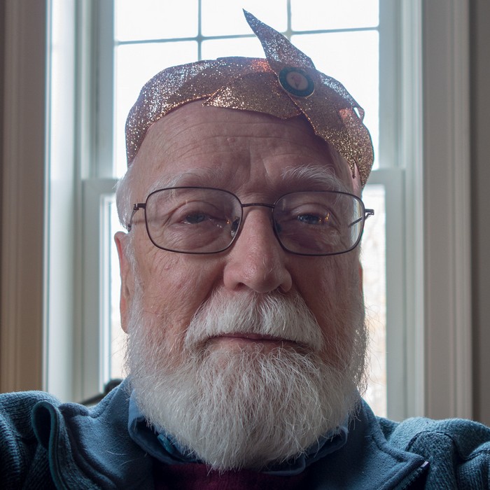 Egils wearing the king's crown for finding the first souvenir in the galette de roi.<br />Jan. 6, 2018 - At Paul and Dominique's in Newbury, Massachusetts.